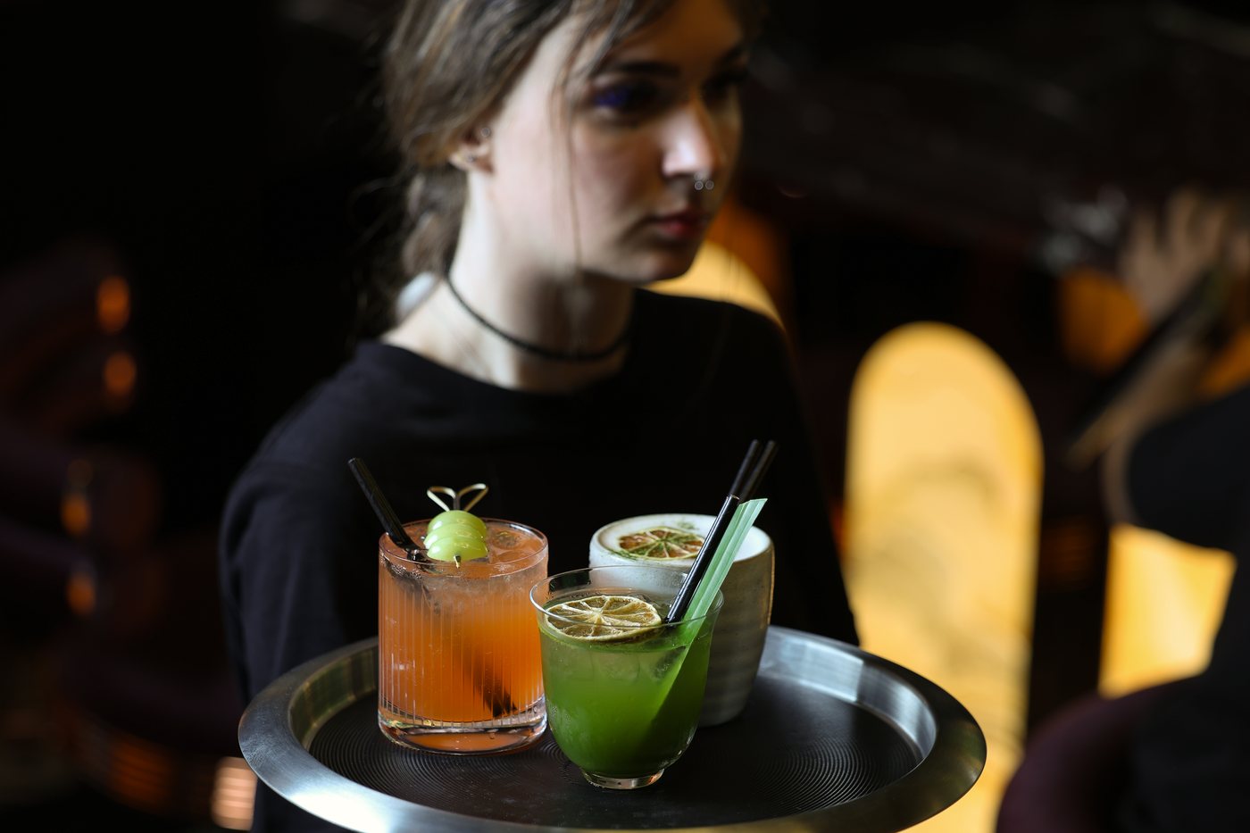 Cocktails carried through the lounge on a tray